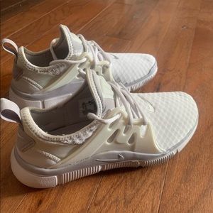 White and grey Nike running shoes